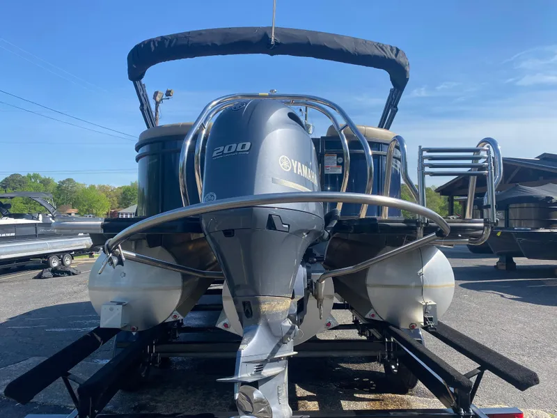 Slide: The Image of 2022 SunChaser Geneva 22 LR DH pontoon boat with Yamaha 200 engine. - 2
