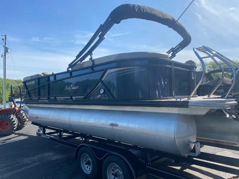 Slide: The Image of 2022 SunChaser Geneva 22 LR DH pontoon boat on a trailer. - 3