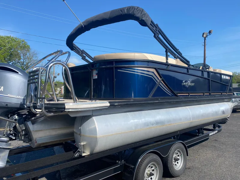 Slide: The Image of 2022 SunChaser Geneva 22 LR DH pontoon boat on a trailer. - 5