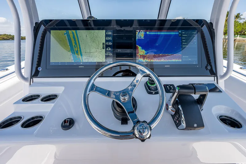 Slide: The Image of 2023 Sportsman Open 352 Center Console helm with dual displays and steering wheel. - 10