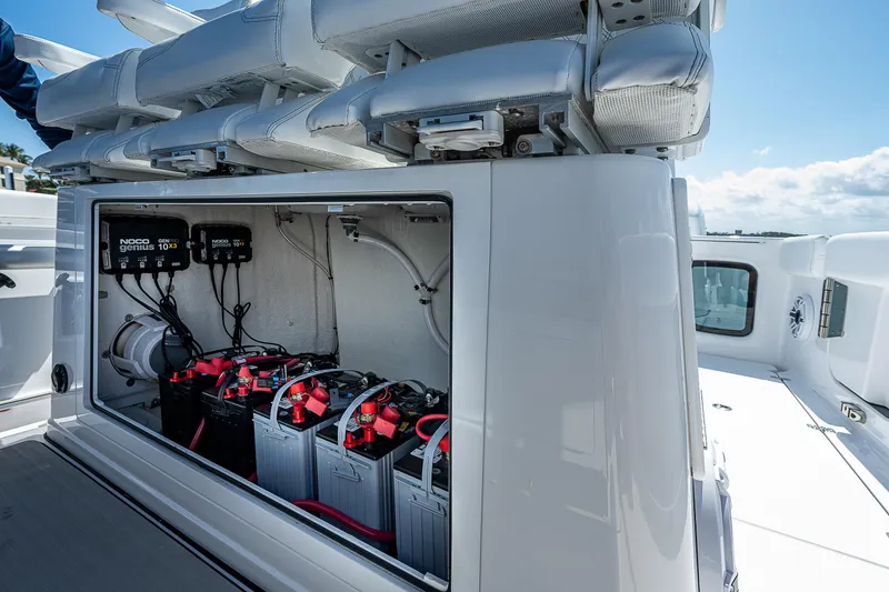 Slide: The Image of Battery compartment of 2023 Sportsman Open 352 Center Console boat. - 13