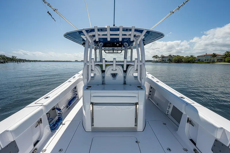 Slide: The Image of 2023 Sportsman Open 352 Center Console boat on calm water. - 19