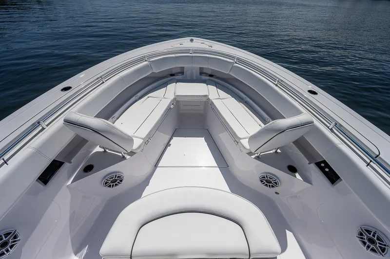 Slide: The Image of 2023 Sportsman Open 352 Center Console boat interior with seating and speakers. - 5