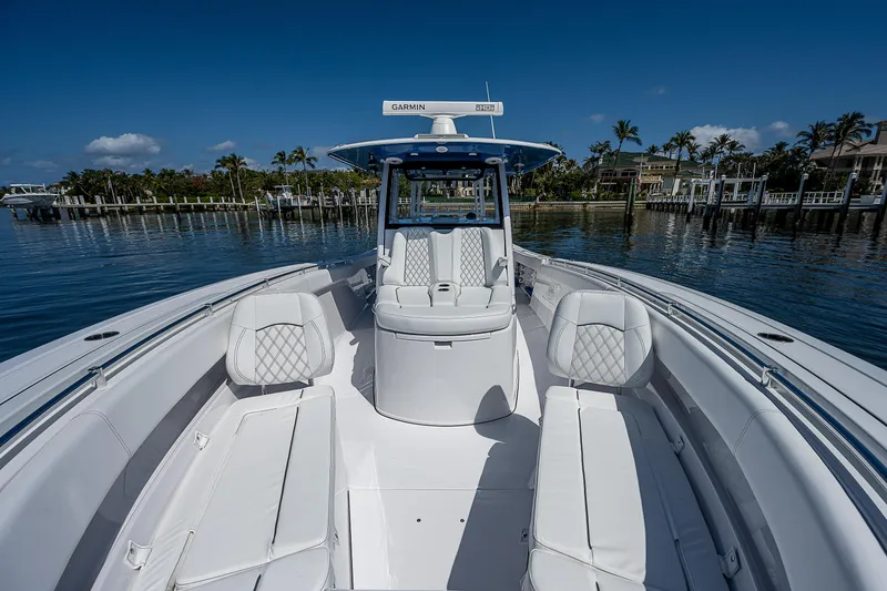 Slide: The Image of 2023 Sportsman Open 352 Center Console boat on calm water. - 7