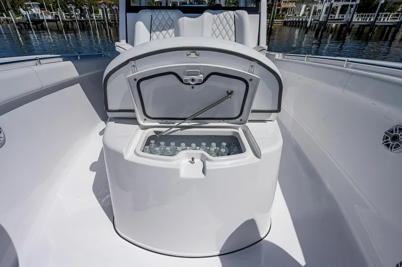 Slide: The Image of 2023 Sportsman Open 352 Center Console boat with open cooler filled with bottled water. - 8
