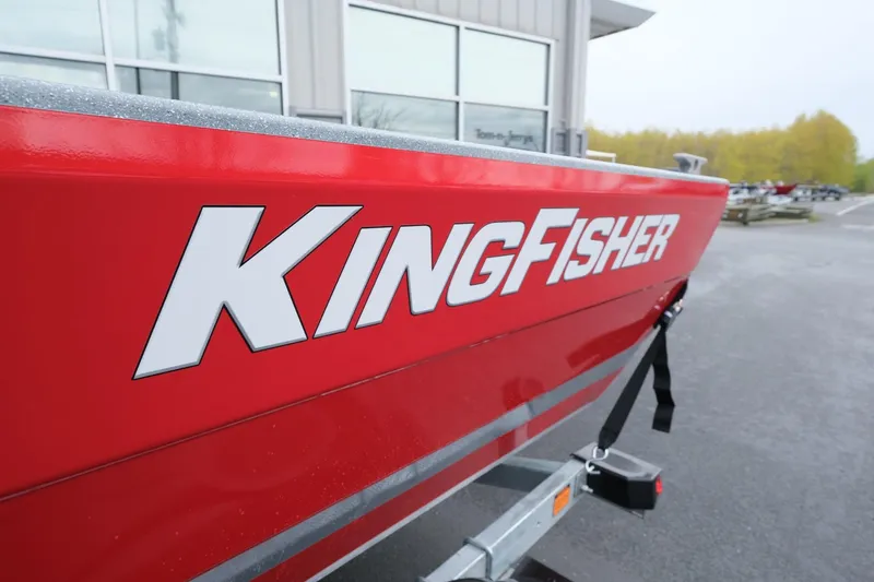 Slide: The Image of Red 2024 KingFisher 1825 Falcon boat on trailer, close-up view. - 15