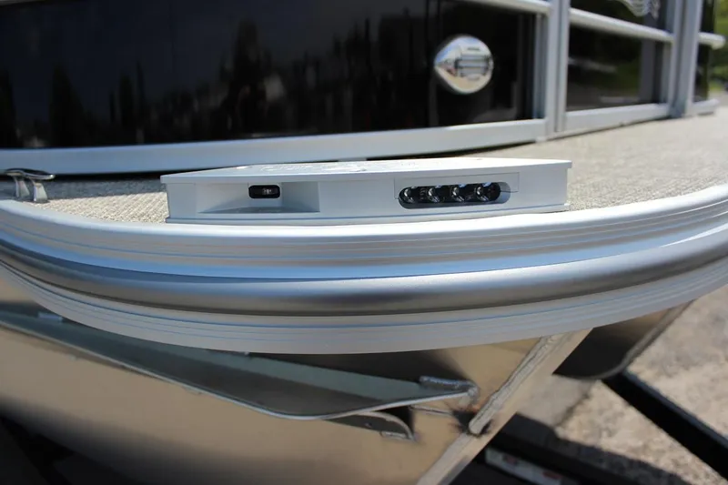Slide: The Image of 2023 SunCatcher Fusion 324 RC pontoon boat, close-up of bow with LED lights. - 12
