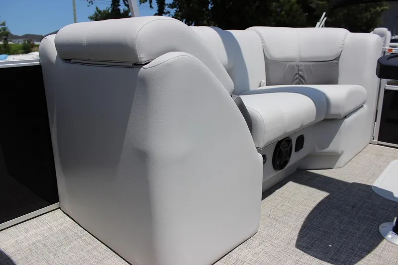 Slide: The Image of 2023 SunCatcher Fusion 324 RC boat interior seating with beige upholstery. - 5
