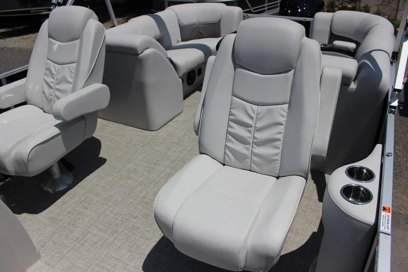 Slide: The Image of 2023 SunCatcher Fusion 324 RC boat interior with luxurious seating. - 6