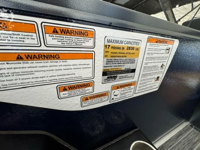 Slide: The Image of 2024 Premier 250 Solaris RL warning labels and maximum capacities information. - 17