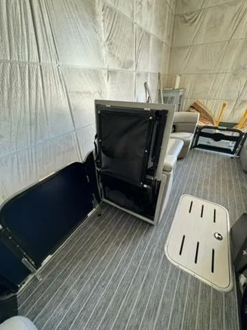 Slide: The Image of 2024 Premier 250 Solaris RL interior with seating and storage compartments. - 19