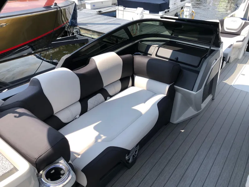 Slide: The Image of 2024 Avalon Excalibur 27' boat with luxurious seating and modern design. - 10