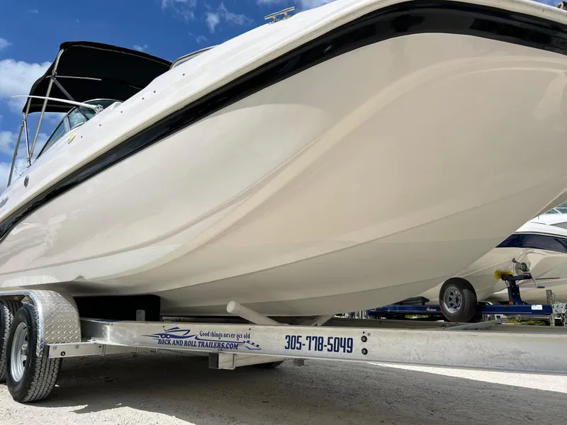 Slide: The Image of 2002 Hurricane 194 boat on trailer, side view. - 11