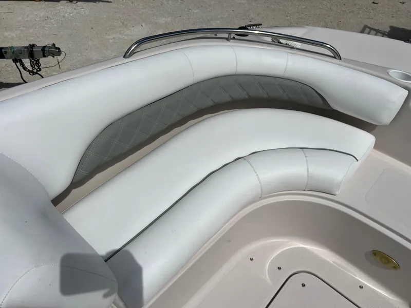 Slide: The Image of White seating area on a 2002 Hurricane 194 boat. - 17