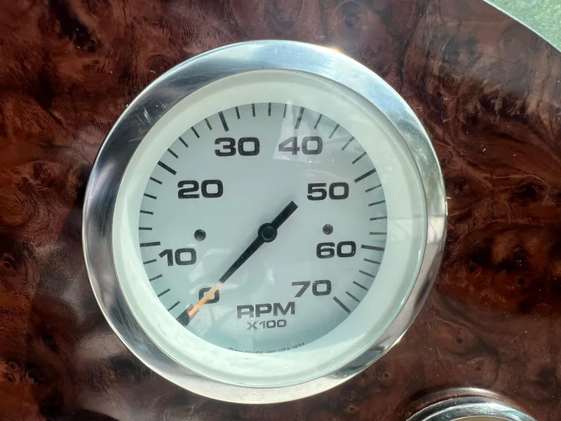 Slide: The Image of Close-up of a 2002 Hurricane 194 RPM gauge. - 26