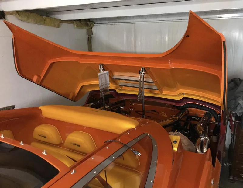 Slide: The Image of 2007 Eliminator 36 Daytona Coupe with open engine hatch in storage. - 7