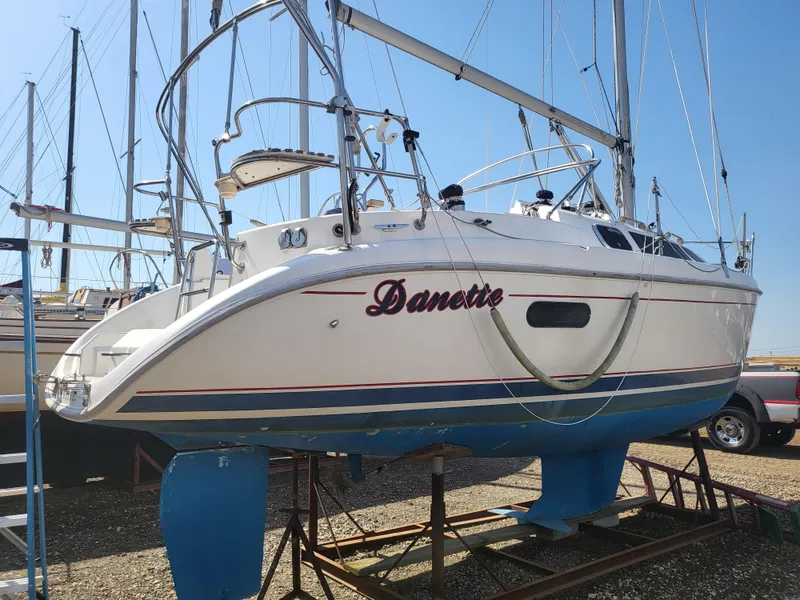 Slide: The Image of 1998 Hunter 280 sailboat on a dry dock. - 10