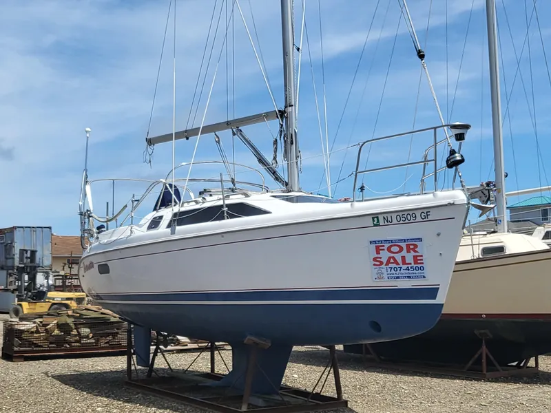 Slide: The Image of 1998 Hunter 280 sailboat for sale on shipyard. - 2