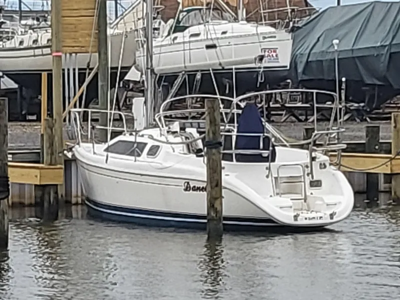 Slide: The Image of 1998 Hunter 280 sailboat docked in harbor. - 7