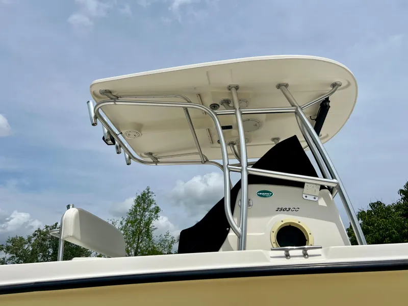 Slide: The Image of 2008 Trophy 2503 boat with T-top against a clear sky. - 11