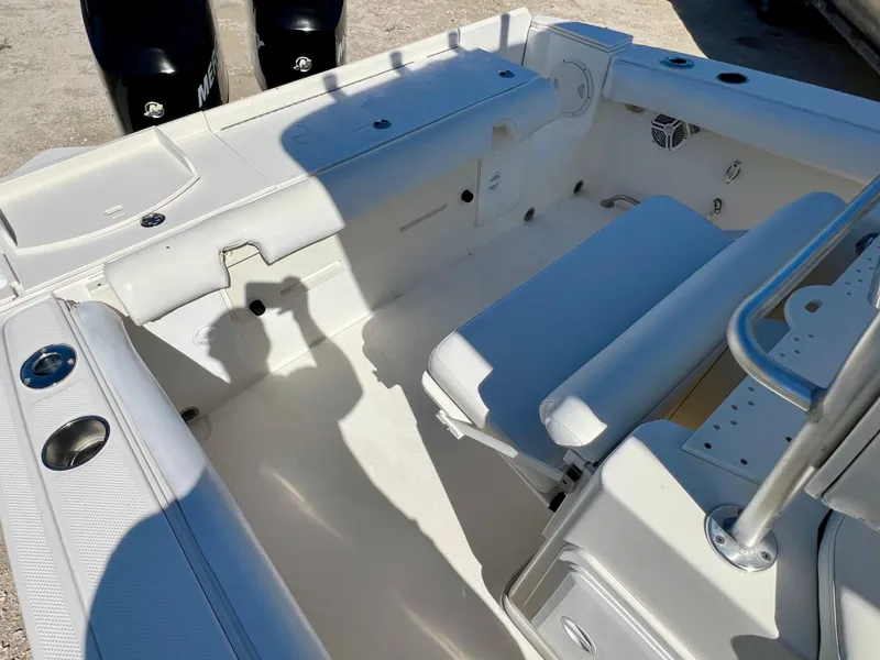 Slide: The Image of 2008 Trophy 2503 boat interior with seating and storage compartments. - 28