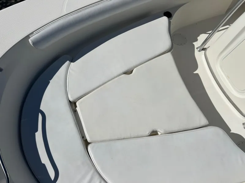 Slide: The Image of 2008 Trophy 2503 boat with cushioned seating area. - 43