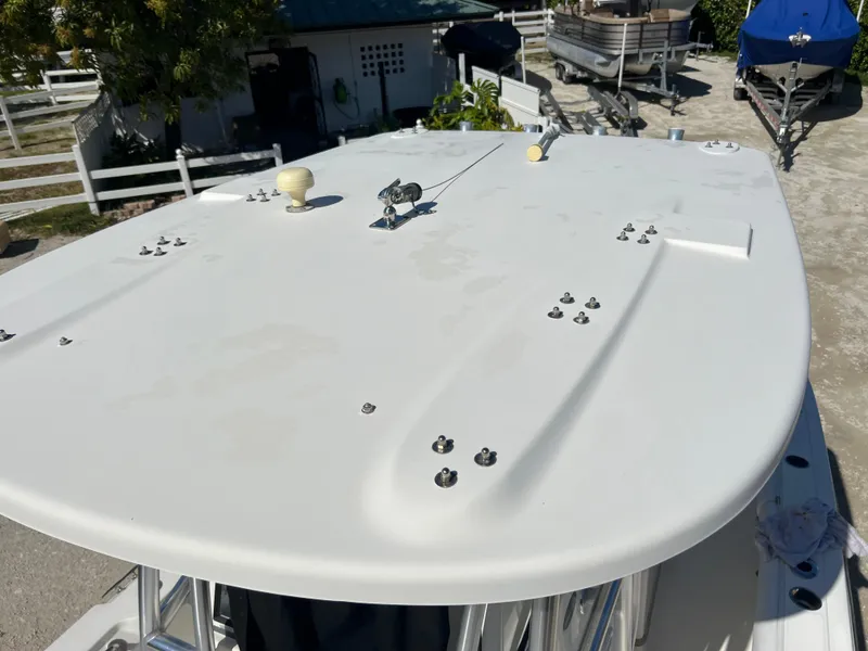 Slide: The Image of 2008 Trophy 2503 boat deck in a marina. - 44