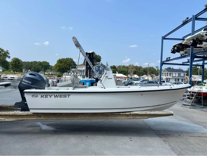 Slide: The Image of 2024 Key West 1720 CC boat with Yamaha engine at marina dock. - 13