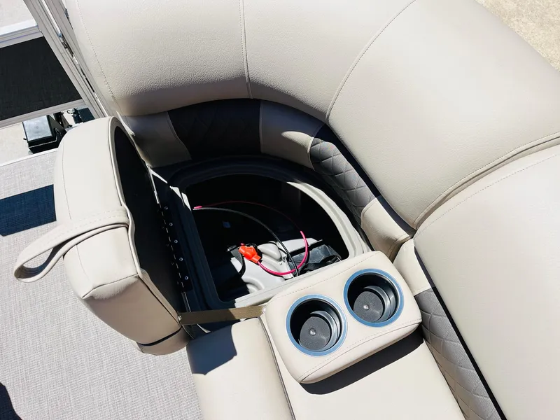 Slide: The Image of 2024 Sun Tracker SportFish 20 DLX boat seat storage with cup holders. - 20