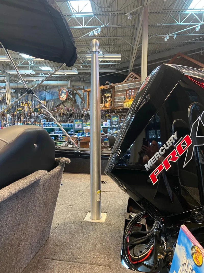 Slide: The Image of 2024 Tracker Targa V-18 Combo boat interior with Mercury Pro X engine. - 14