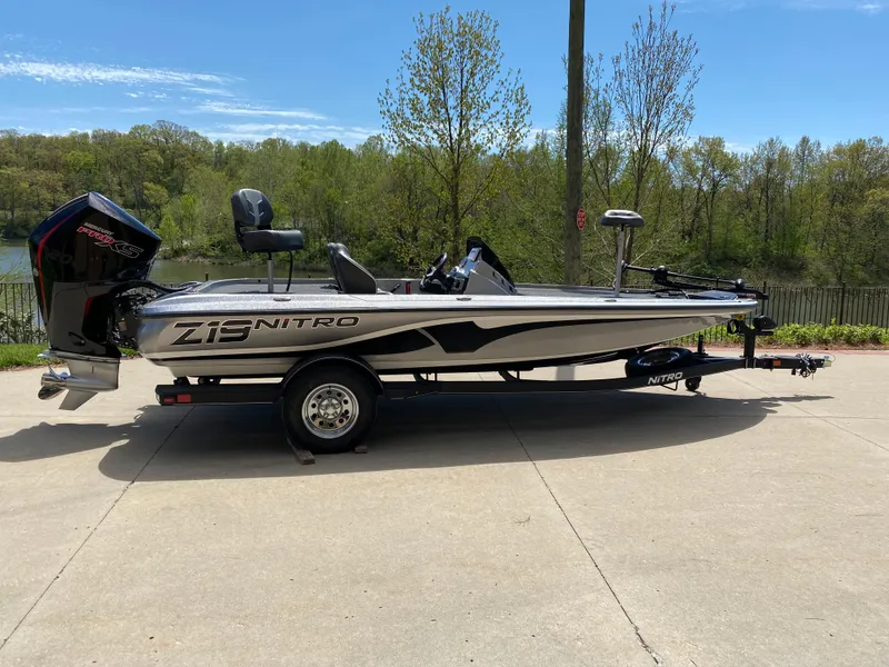 The Image of 2024 Nitro Z19 fishing boat on trailer, side view, outdoors. - 0