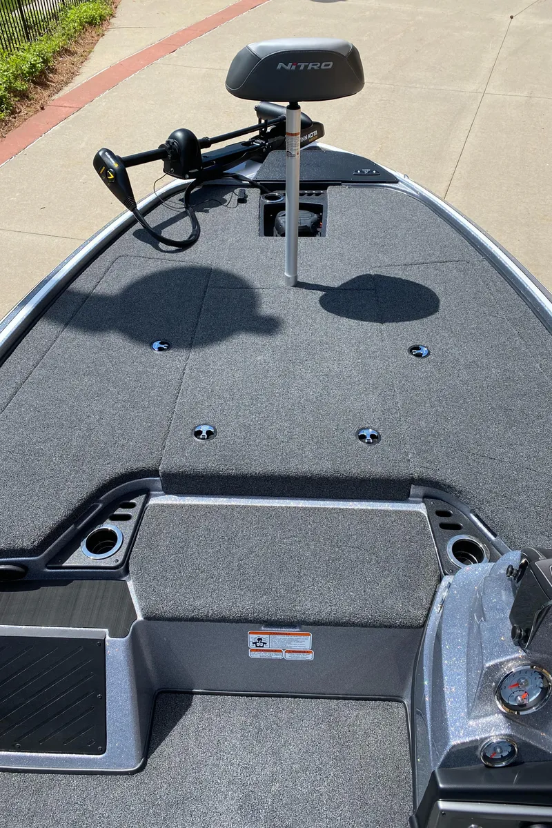 Slide: The Image of 2024 Nitro Z19 fishing boat deck with trolling motor and seat. - 4