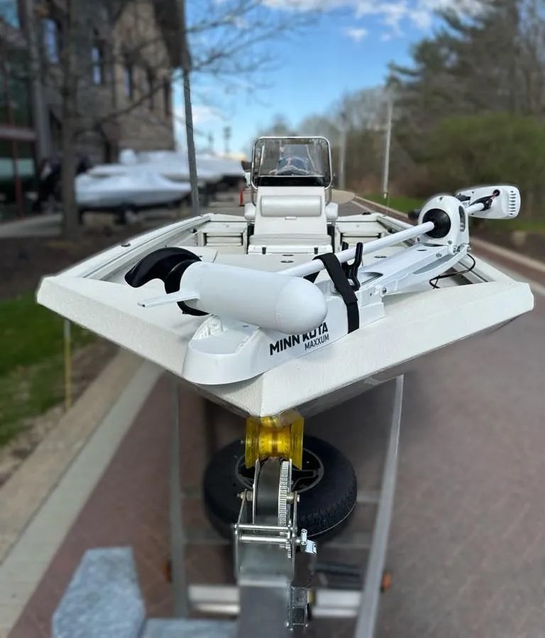 Slide: The Image of 2024 Ranger RB200 boat with Minn Kota trolling motor on a trailer. - 2