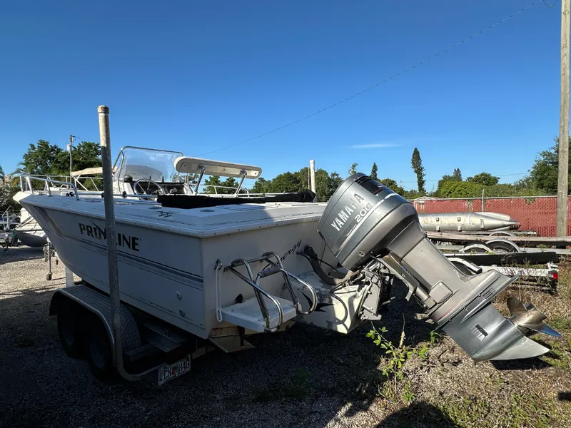 Slide: The Image of 1991 Pro-Line 210 boat with Yamaha outboard motor on trailer. - 3