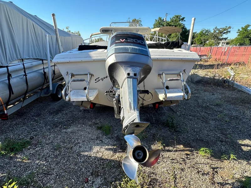 Slide: The Image of 1991 Pro-Line 210 boat with Yamaha V200 outboard motor. - 4