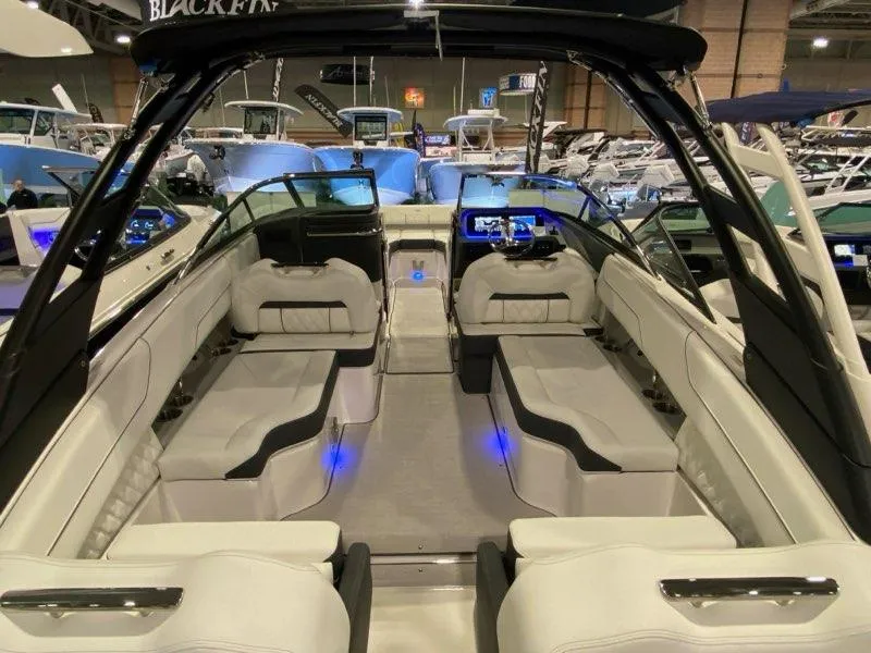 Slide: The Image of Luxurious 2025 Regal LX4 boat interior with modern seating and ambient lighting. - 3