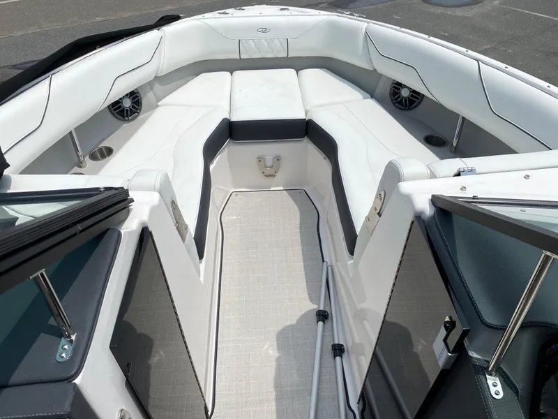 Slide: The Image of Luxurious 2025 Regal LX4 boat interior with white seating and modern design. - 7