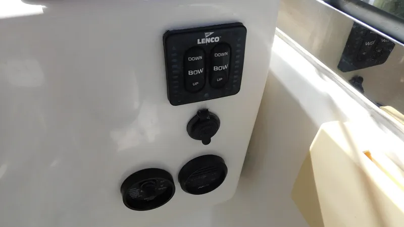 Slide: The Image of Control panel on a 2005 Legacy Yachts 28 Express boat. - 9
