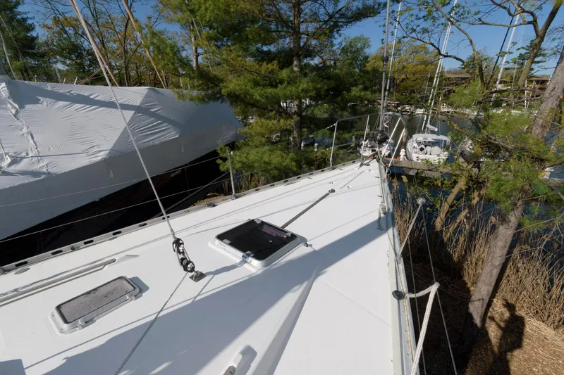 Slide: The Image of 1985 Beneteau 42 First sailboat deck view in a marina. - 17