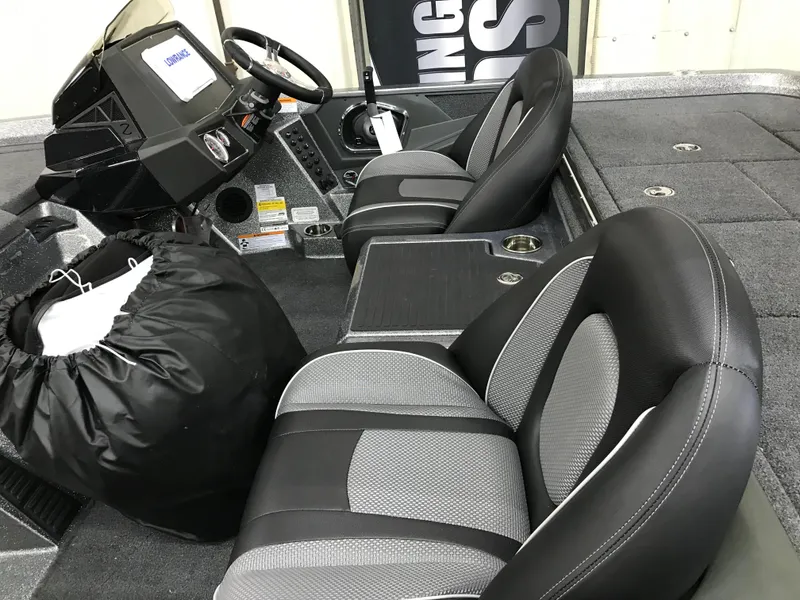 Slide: The Image of 2024 Ranger Z518 Ranger Cup Equipped interior with dual seats and console. - 13