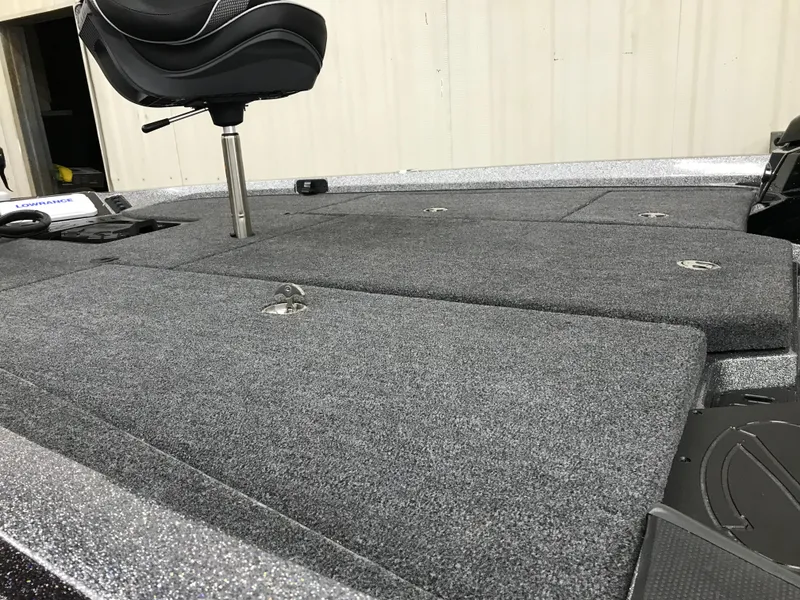 Slide: The Image of 2024 Ranger Z518 Ranger Cup Equipped boat deck with seating and storage compartments. - 4