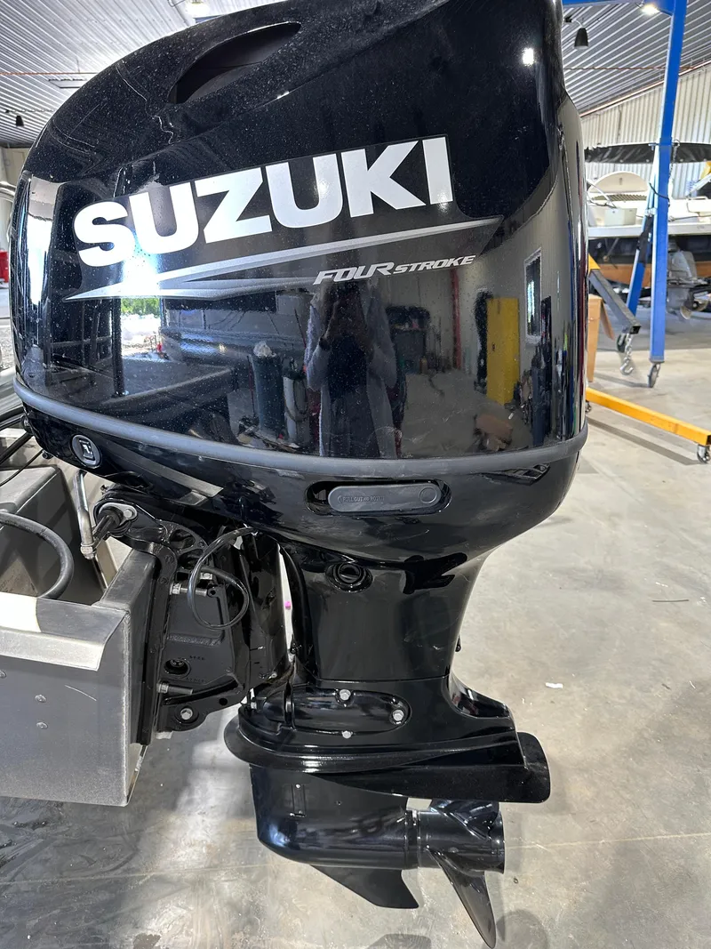 Slide: The Image of 2024 South Bay 224RSLE with Suzuki Four Stroke outboard motor. - 12