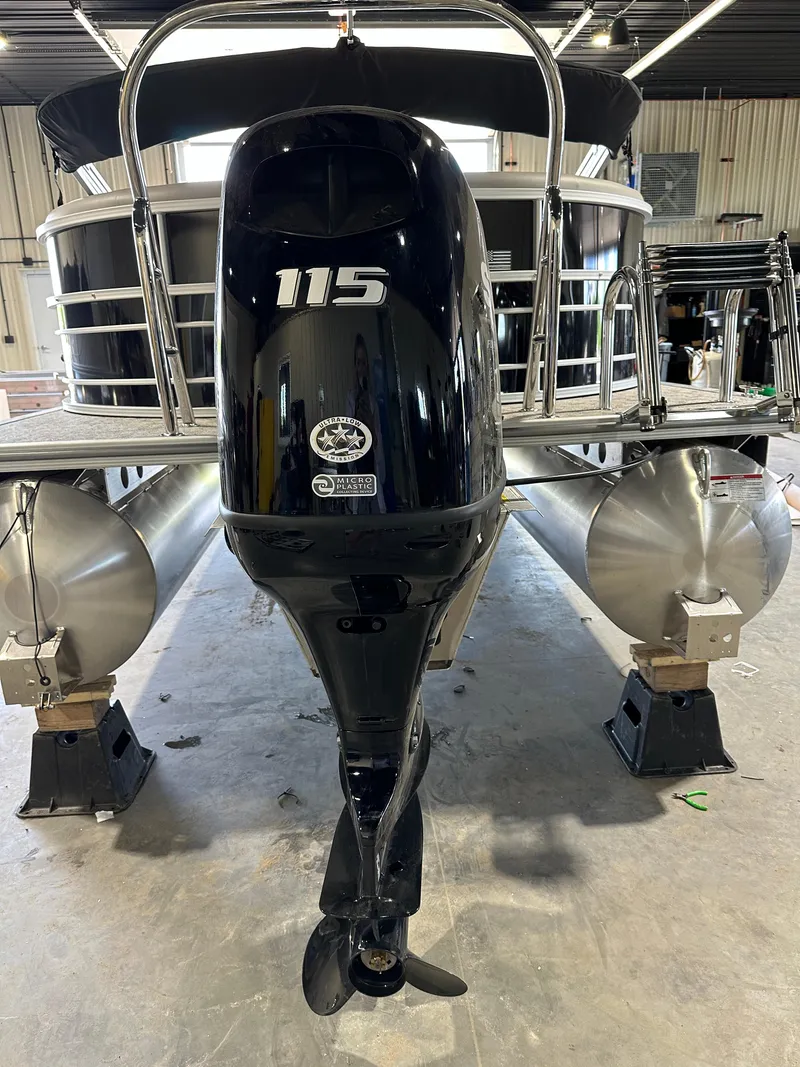 Slide: The Image of 2024 South Bay 224RSLE pontoon boat with 115 HP outboard motor. - 13