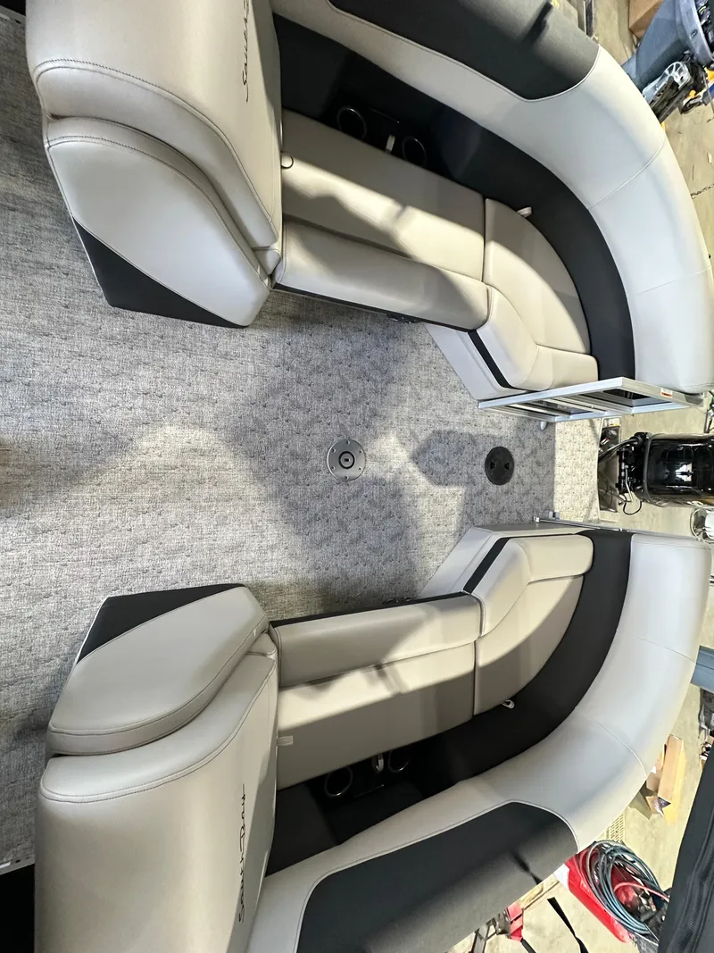 Slide: The Image of 2024 South Bay 224RSLE boat interior with plush seating and modern design. - 4
