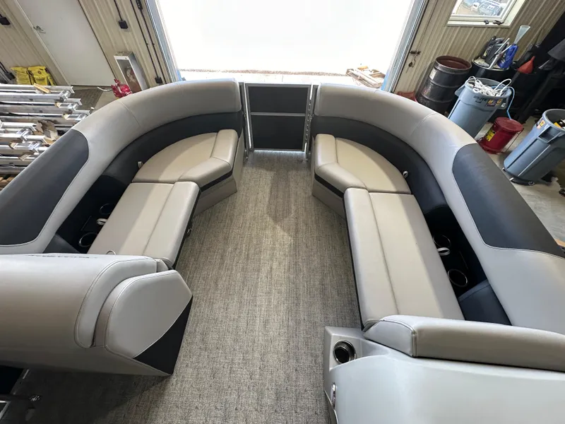 Slide: The Image of 2024 South Bay 224RSLE pontoon boat interior with spacious seating and modern design. - 5