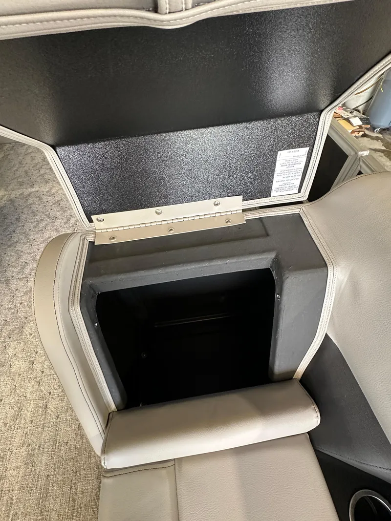 Slide: The Image of Open storage compartment in 2024 South Bay 224RSLE boat. - 7