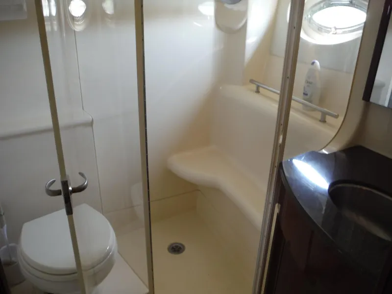 Slide: The Image of Bathroom interior of a 2014 Meridian 441 Sedan yacht with shower and toilet. - 12