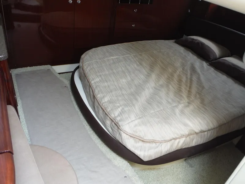 Slide: The Image of Luxurious bedroom interior of 2014 Meridian 441 Sedan yacht with a cozy bed. - 13