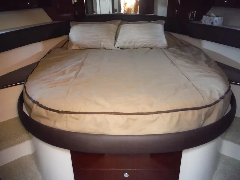 Slide: The Image of Luxurious bedroom in 2014 Meridian 441 Sedan yacht with a cozy double bed. - 15