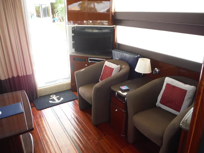 Slide: The Image of Interior of 2014 Meridian 441 Sedan yacht with plush seating and modern amenities. - 22